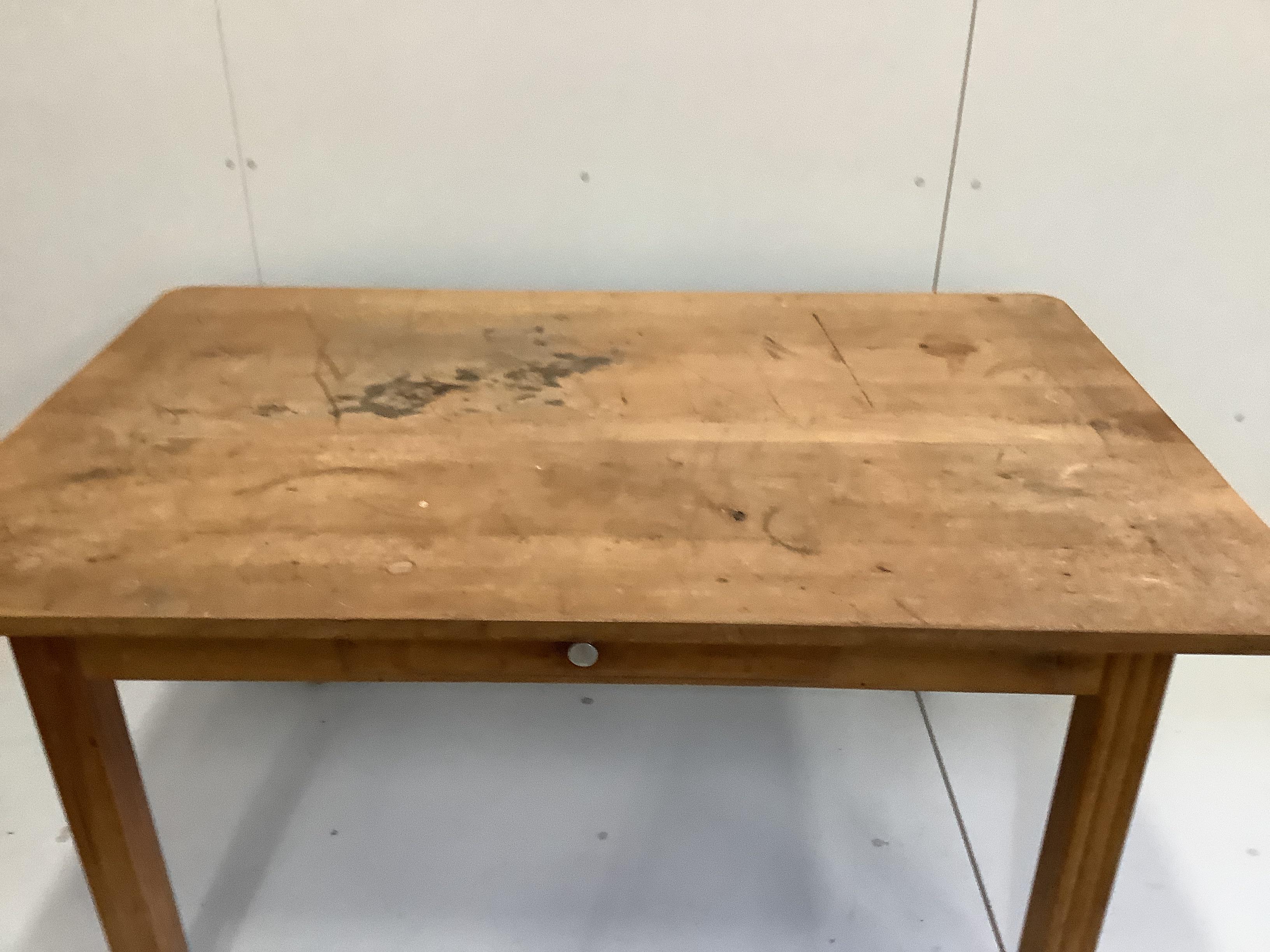 An early 20th century French fruitwood kitchen table with one drawer, width 149cm, depth 95cm, height 74cm